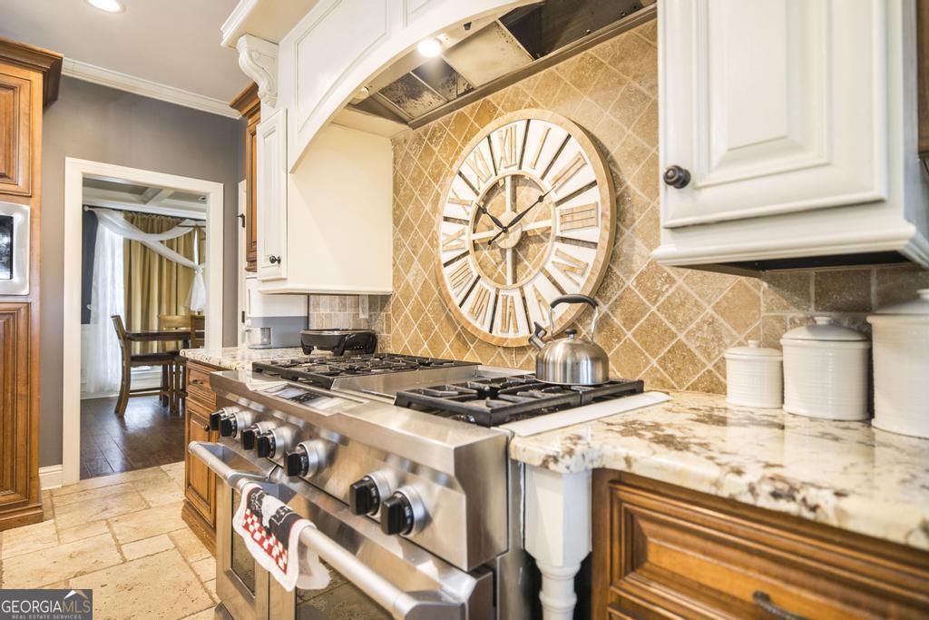4065 Gordon Road Abbeville, GA 31001 - Photo 13 of 48 a kitchen with a stove and a white refrigerator