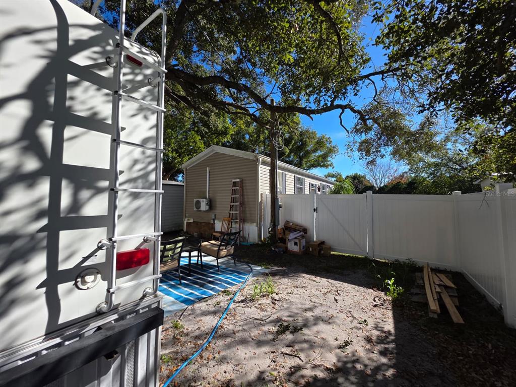 2000 Palm Street St. Cloud, FL 34769 - Photo 9 of 21 a backyard of a house with lots of green space
