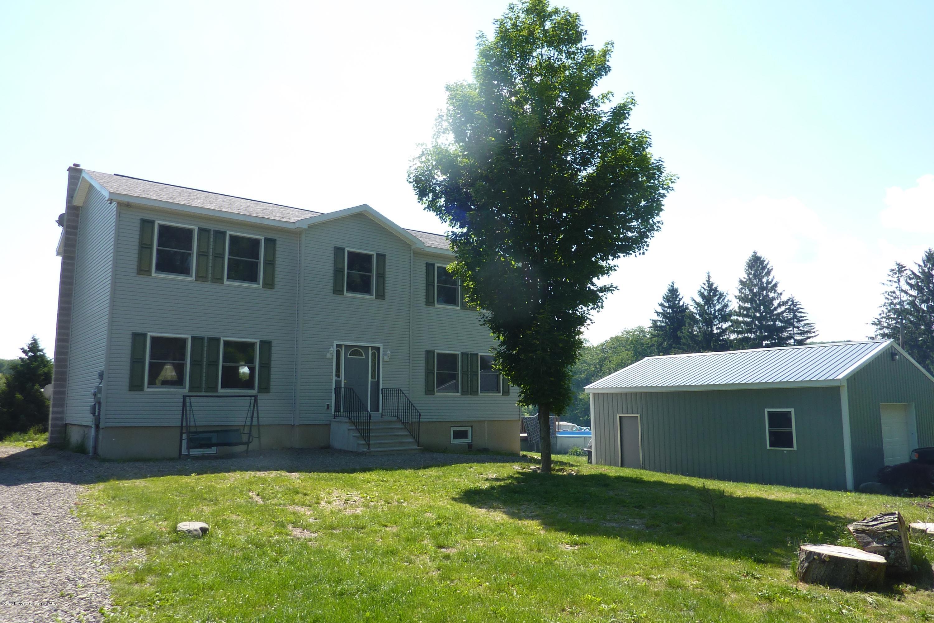 4110 Bear Brook Road Moscow, PA 18444 - Photo 1 of 31 a view of a house with a yard