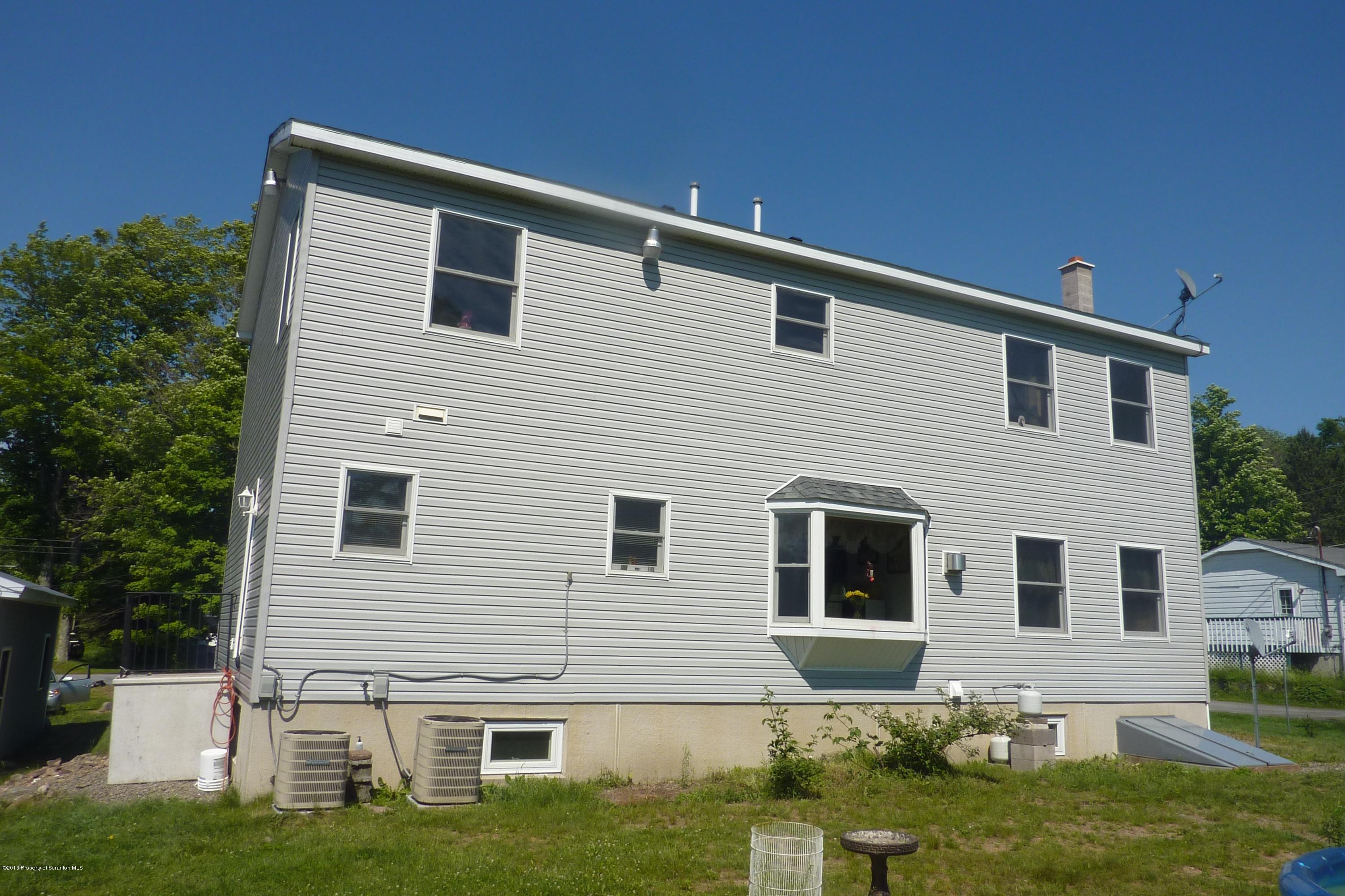 4110 Bear Brook Road Moscow, PA 18444 - Photo 30 of 31 a front view of a house with a yard