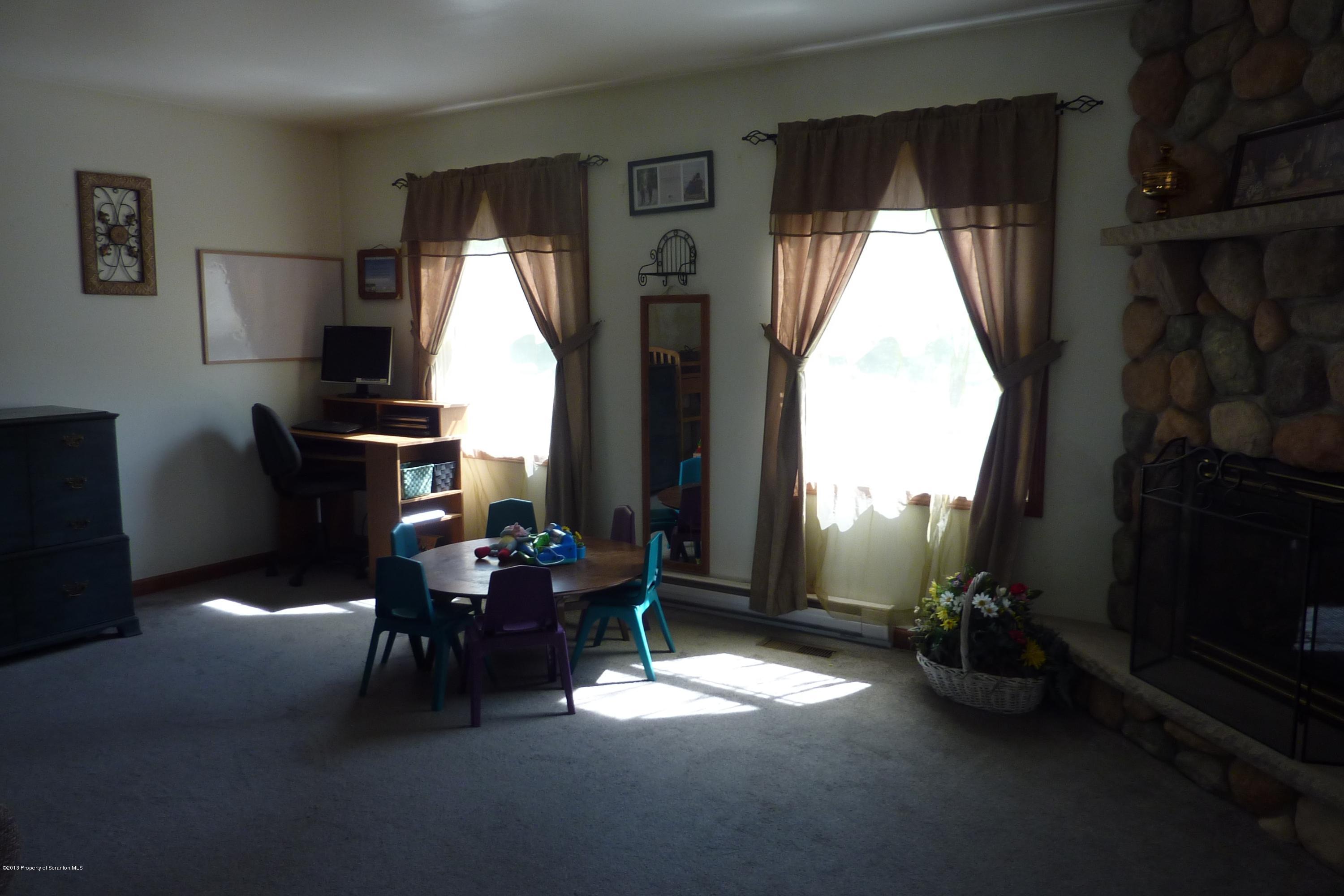 4110 Bear Brook Road Moscow, PA 18444 - Photo 10 of 31 a dining room with furniture and window