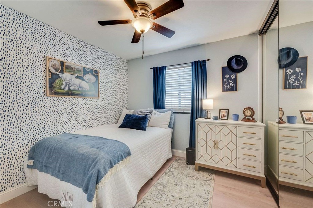 10744 Sundance Drive Rancho Cucamonga, CA 91730 - Photo 14 of 27 a bedroom with a bed and a table