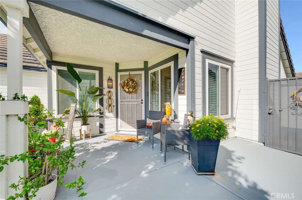 10744 Sundance Drive Rancho Cucamonga, CA 91730 - Photo 2 of 27 a potted plant sitting in front of a house