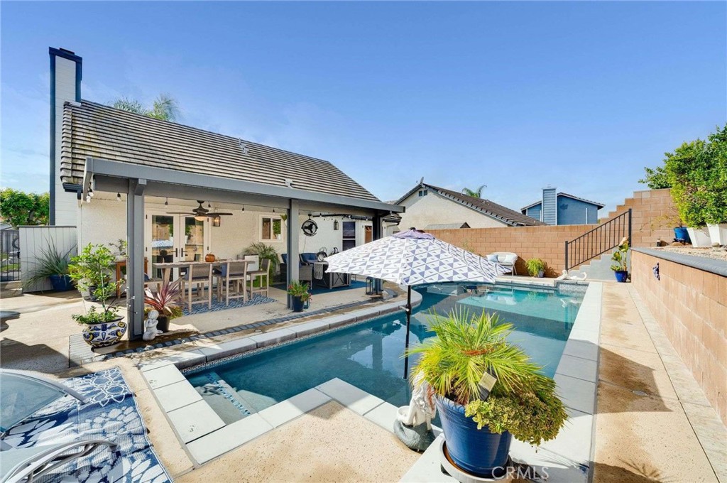 10744 Sundance Drive Rancho Cucamonga, CA 91730 - Photo 25 of 27 a front view of house with yard and outdoor seating
