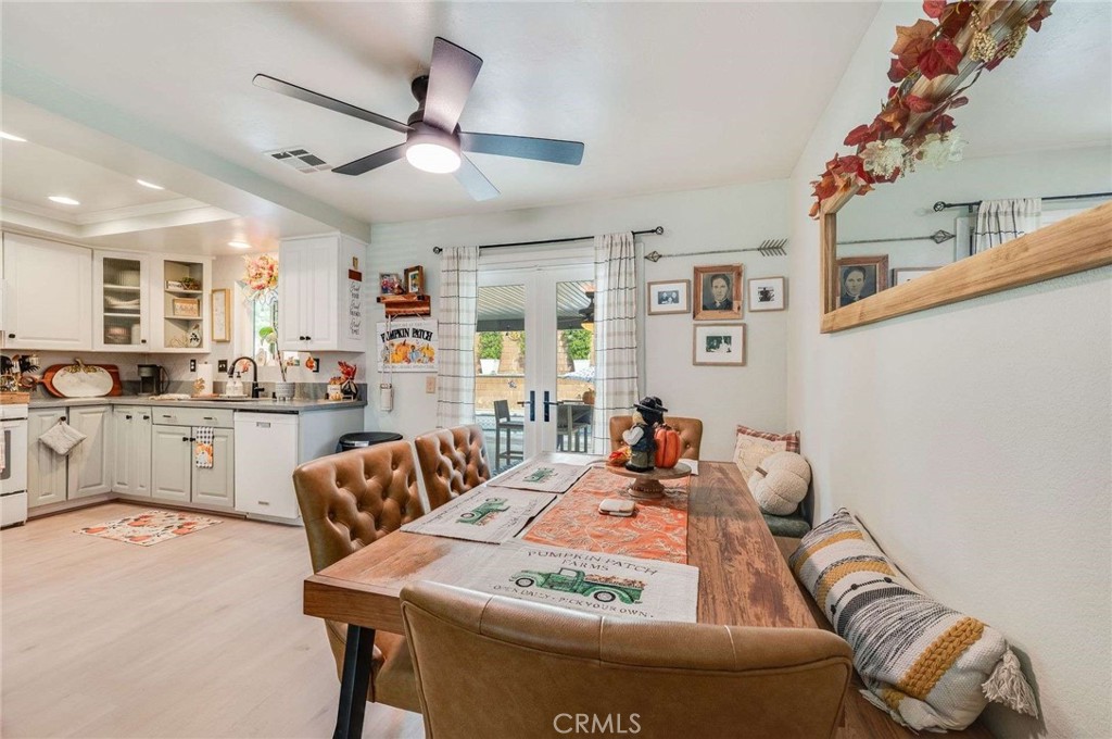 10744 Sundance Drive Rancho Cucamonga, CA 91730 - Photo 6 of 27 a living room with furniture and kitchen view