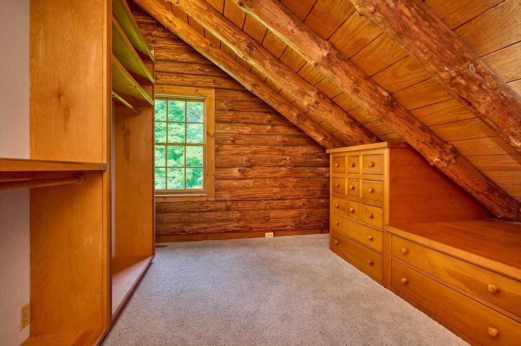 63 Montague Road Leverett, MA 01054 - Photo 27 of 42 a view of an empty room with windows