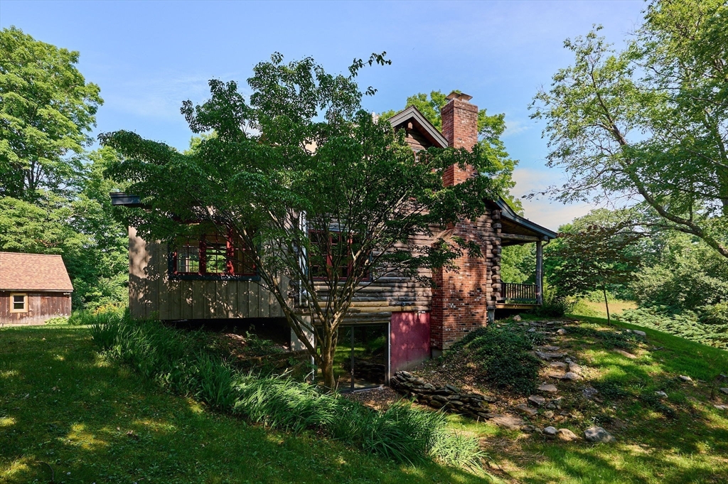 63 Montague Road Leverett, MA 01054 - Photo 31 of 42 a view of a house with a park