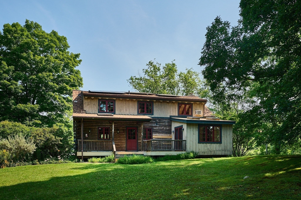63 Montague Road Leverett, MA 01054 - Photo 5 of 42 a view of house with a yard