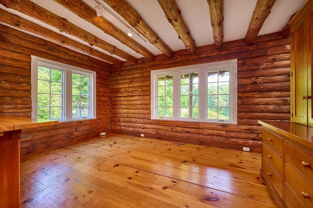 63 Montague Road Leverett, MA 01054 - Photo 8 of 42 a view of an empty room with a window