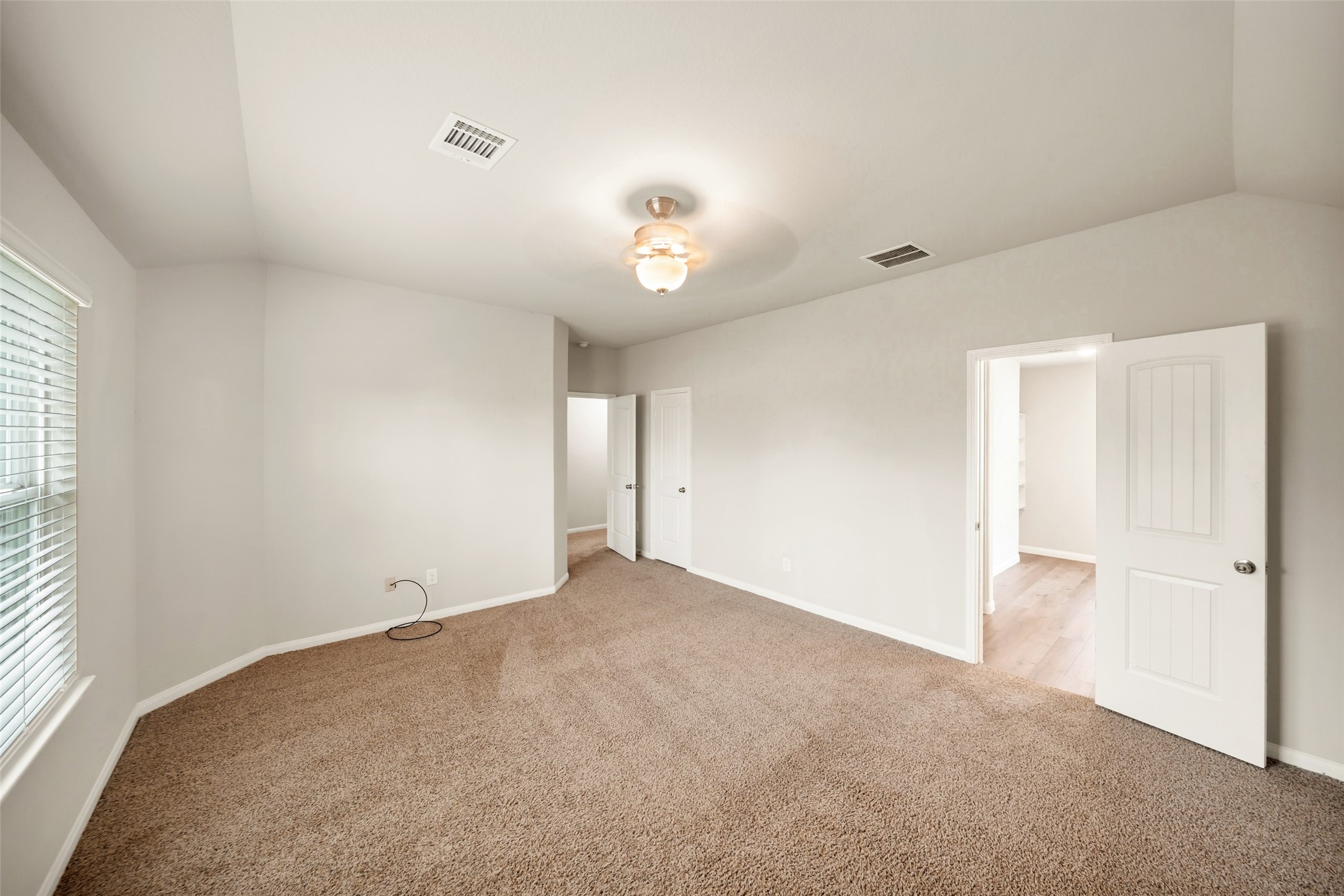 3628 Cub Drive Conroe, TX 77301 - Photo 19 of 32 ...And equipped with ceiling fan & beautiful en-suite bathroom.