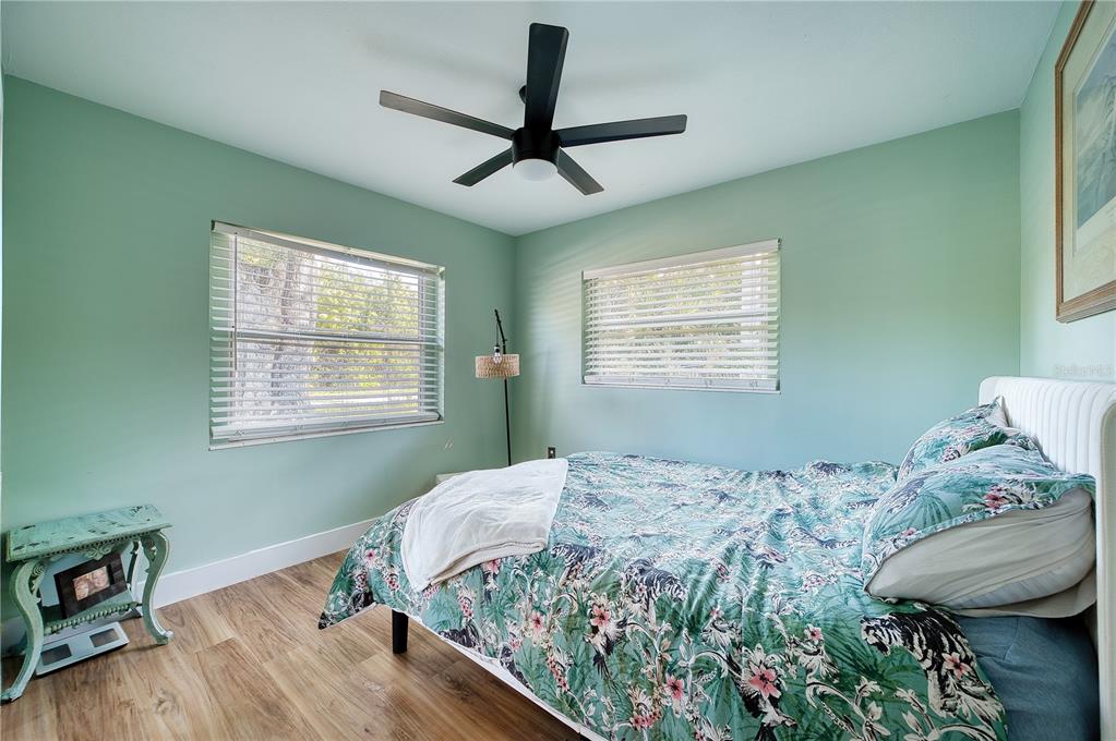 1027 Coral Ridge Drive Punta Gorda, FL 33950 - Photo 17 of 46 a bedroom with a bed and a window