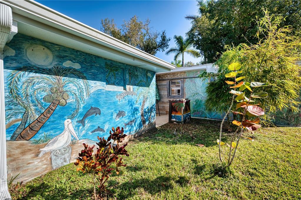 1027 Coral Ridge Drive Punta Gorda, FL 33950 - Photo 28 of 46 a view of a backyard with plants