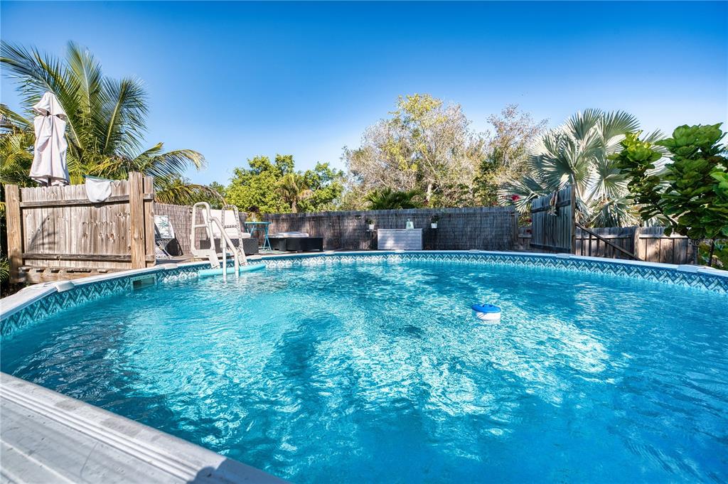 1027 Coral Ridge Drive Punta Gorda, FL 33950 - Photo 33 of 46 a view of a backyard with a garden