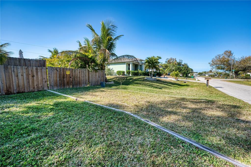 1027 Coral Ridge Drive Punta Gorda, FL 33950 - Photo 37 of 46 a view of a back yard of the house