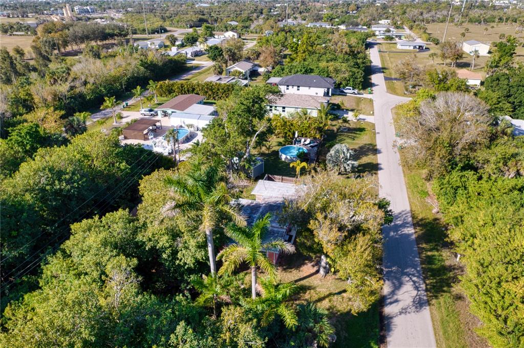 1027 Coral Ridge Drive Punta Gorda, FL 33950 - Photo 43 of 46 an aerial view of residential houses with outdoor space and trees