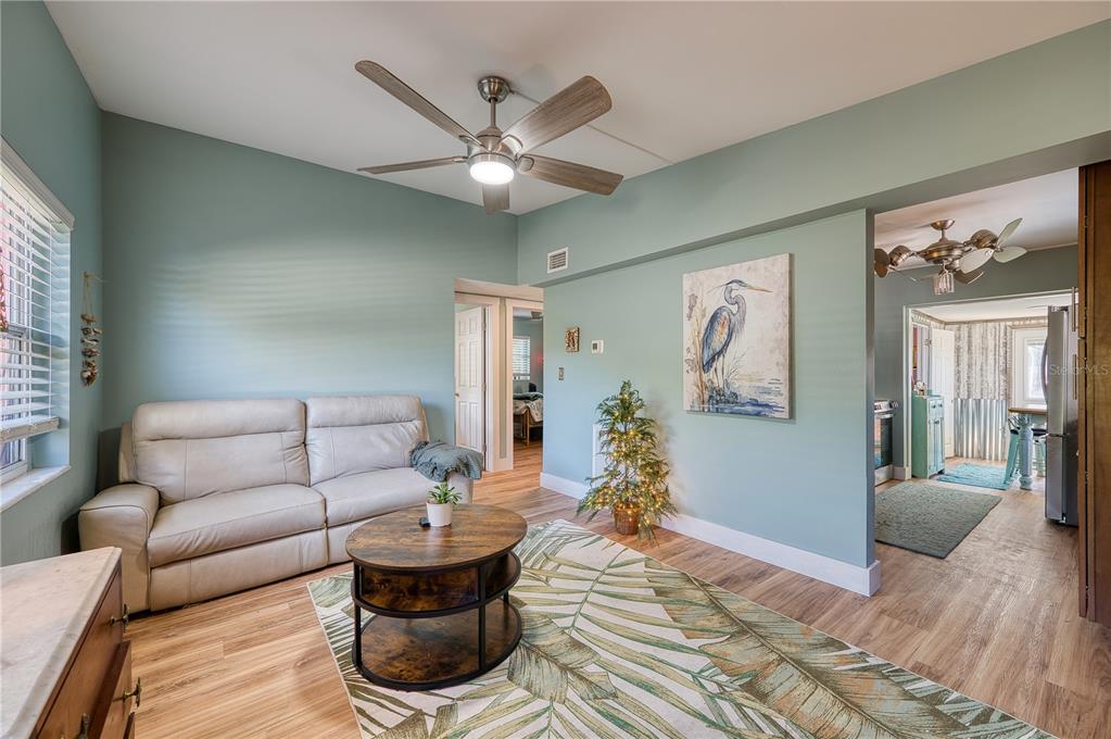 1027 Coral Ridge Drive Punta Gorda, FL 33950 - Photo 7 of 46 a living room with furniture and a large window