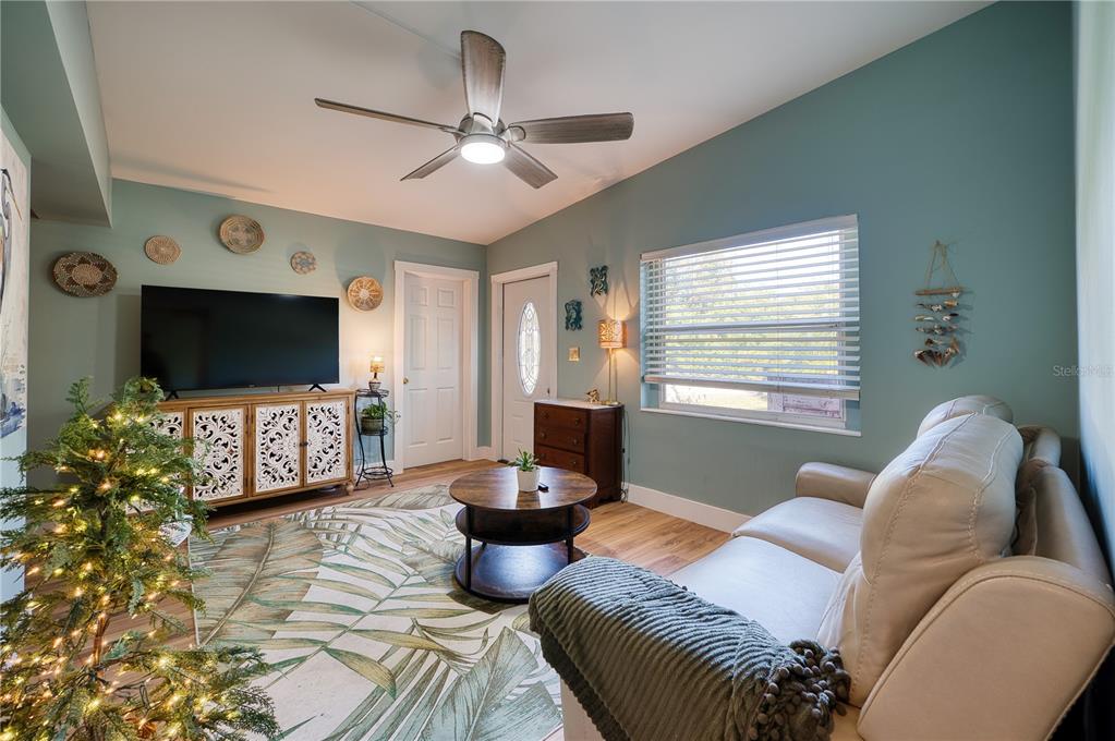 1027 Coral Ridge Drive Punta Gorda, FL 33950 - Photo 8 of 46 a living room with furniture and a flat screen tv