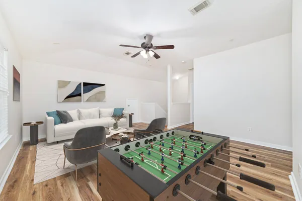 a view of entryway with wooden floor