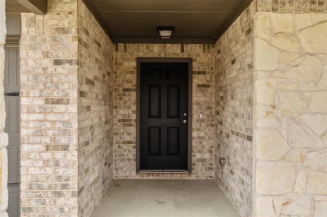 a front view of a house with a door
