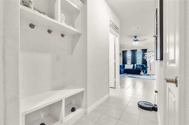 a view of kitchen with furniture and wooden floor