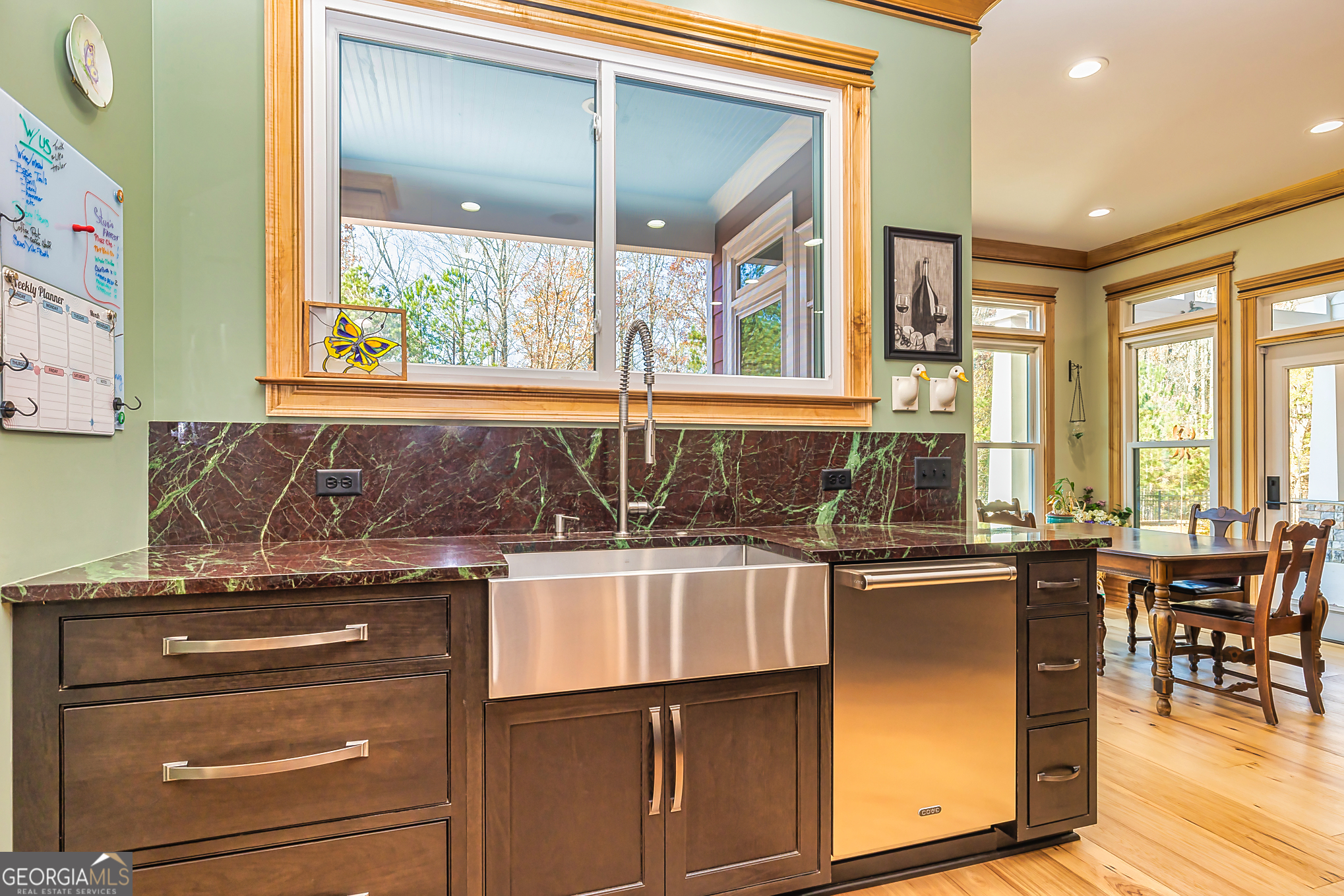 242 Kirkley Road Tyrone, GA 30290 - Photo 15 of 50 a kitchen with a stove a sink and cabinets