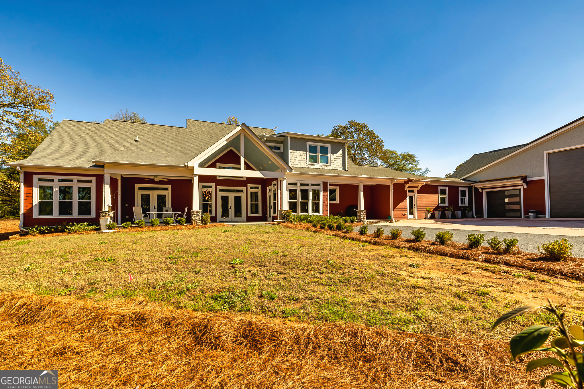 242 Kirkley Road Tyrone, GA 30290 - Photo 21 of 50 a front view of a house with a yard