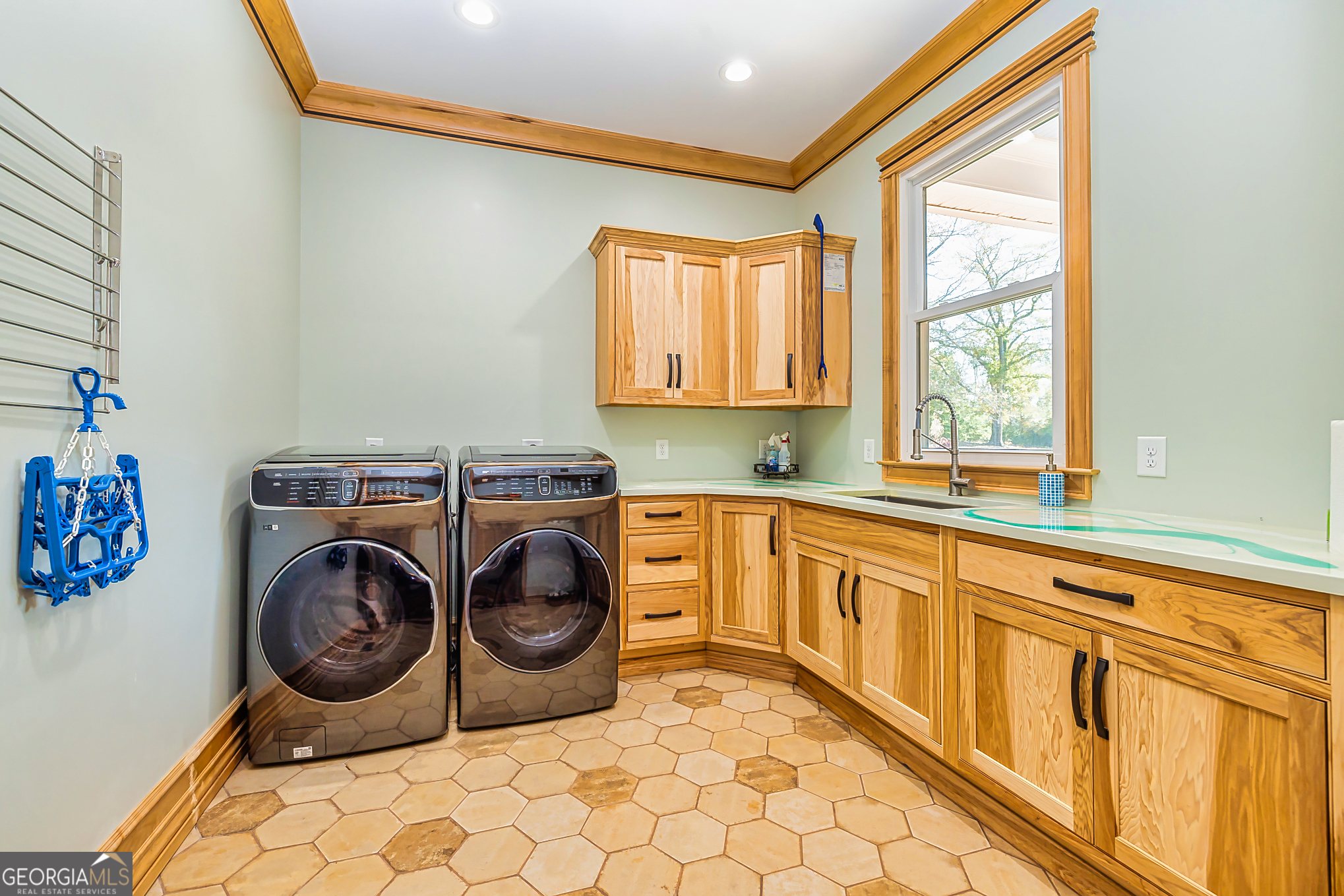 242 Kirkley Road Tyrone, GA 30290 - Photo 28 of 50 a utility room with sink dryer and washer