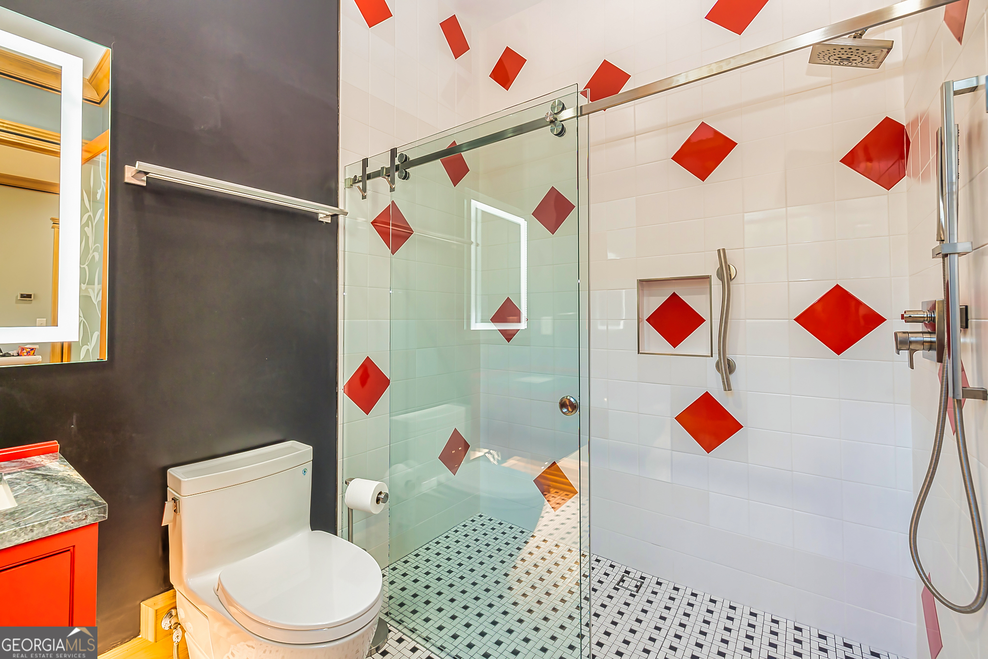 242 Kirkley Road Tyrone, GA 30290 - Photo 33 of 50 a bathroom with a sink a toilet and shower curtain