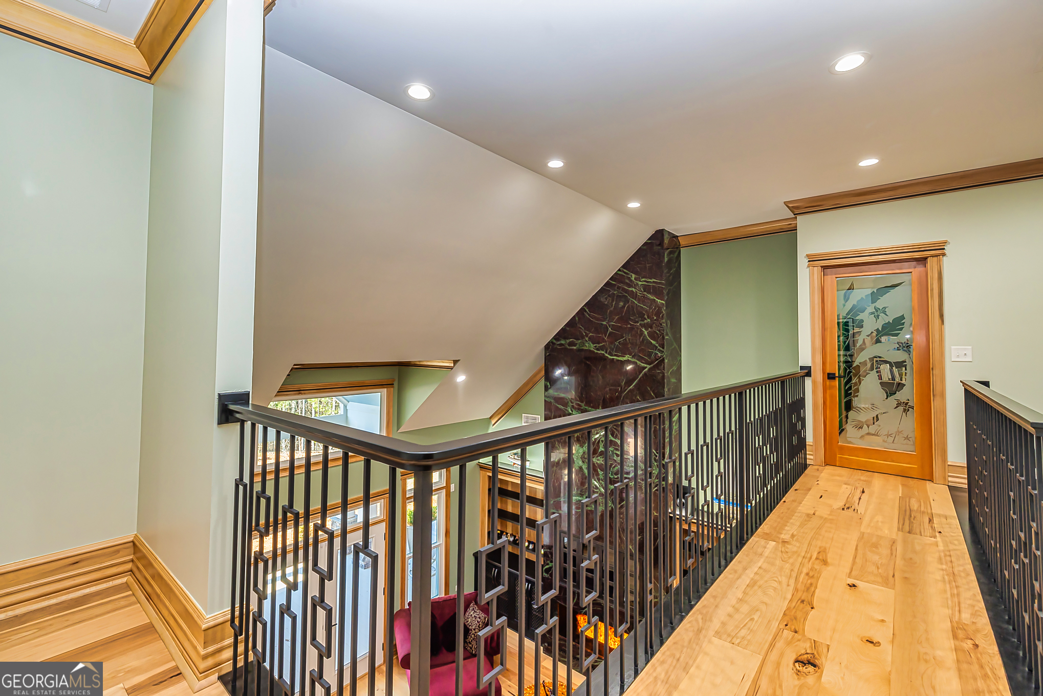 242 Kirkley Road Tyrone, GA 30290 - Photo 34 of 50 a view of a hallway with wooden floor and furniture