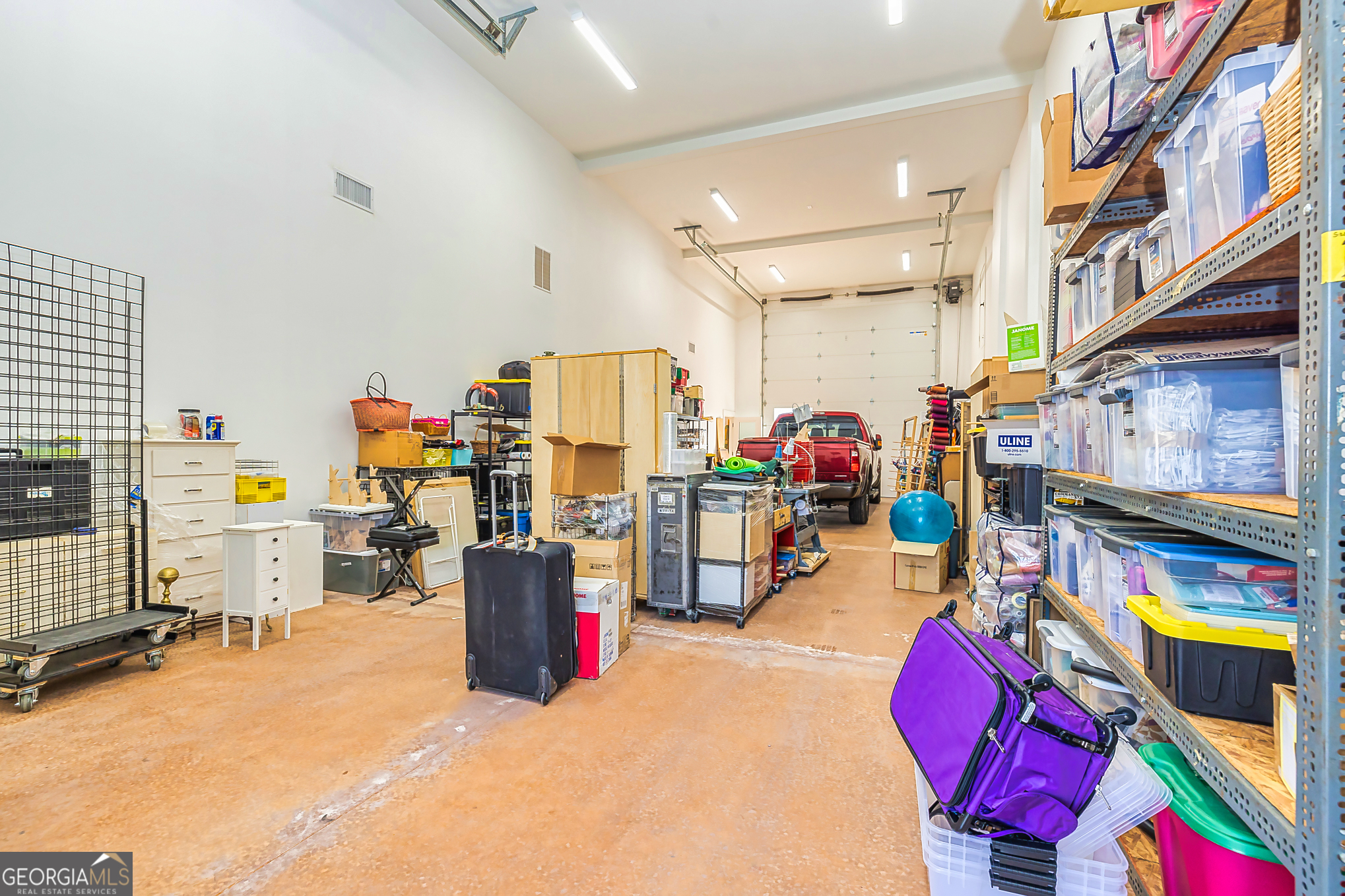 242 Kirkley Road Tyrone, GA 30290 - Photo 43 of 50 a living room with furniture and a flat screen tv