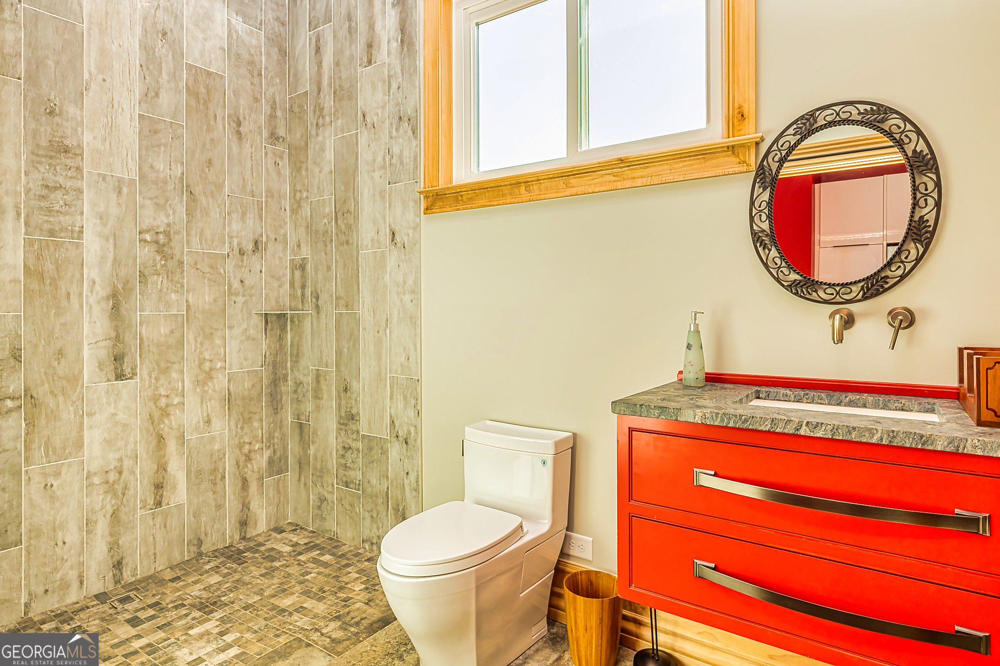 242 Kirkley Road Tyrone, GA 30290 - Photo 48 of 50 a bathroom with a toilet and a sink