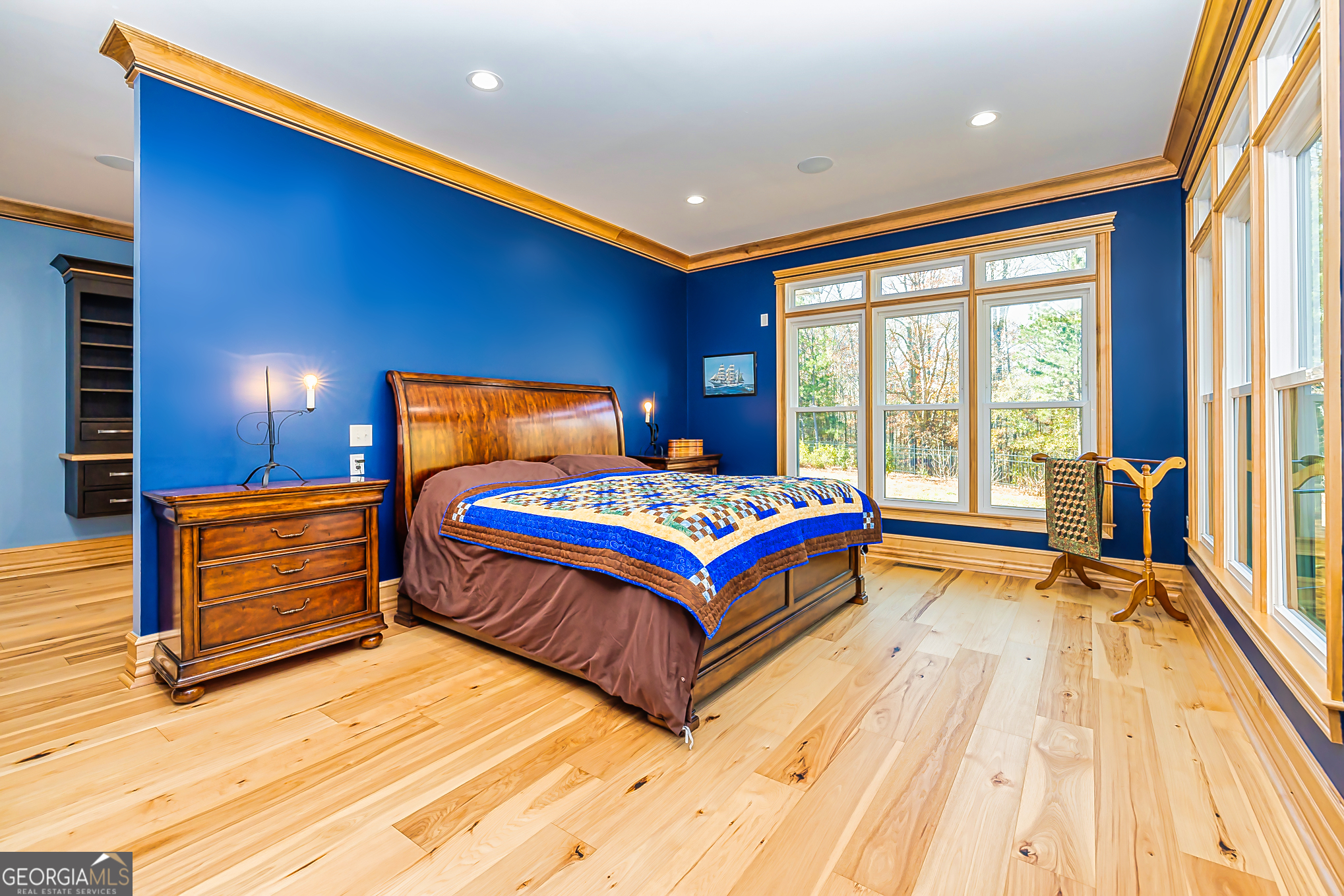 242 Kirkley Road Tyrone, GA 30290 - Photo 7 of 50 a bedroom with a bed and wooden floor