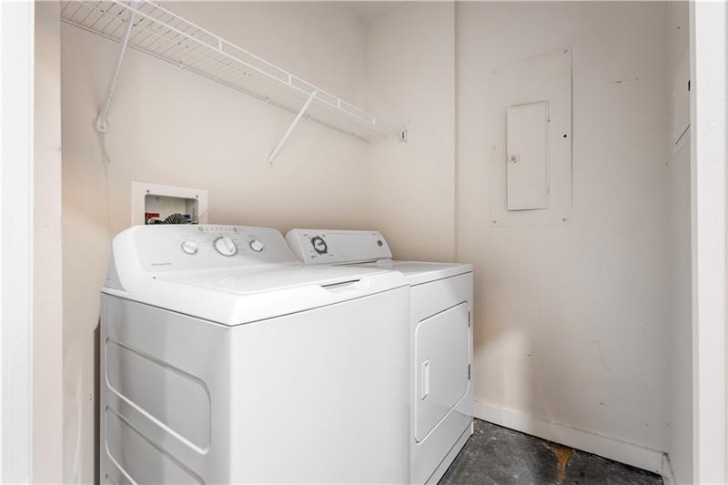 250 Pharr Road Northeast, Unit 308 Atlanta, GA 30305 - Photo 16 of 35 a utility room with dryer and washer