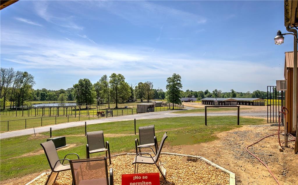 486 County Line Road Resaca, GA 30735 - Photo 25 of 49 a view of a swimming pool with outdoor seating and plants