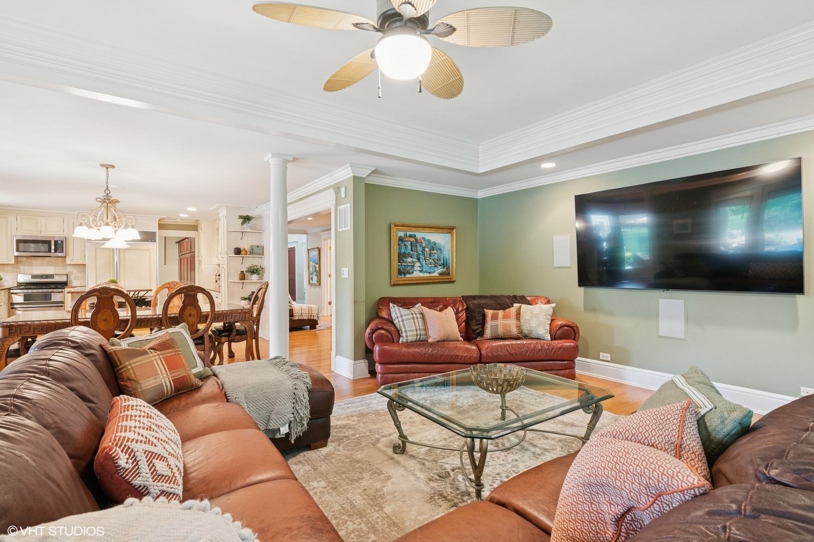 6730 South Madison Street Willowbrook, IL 60527 - Photo 12 of 52 a living room with furniture and a flat screen tv