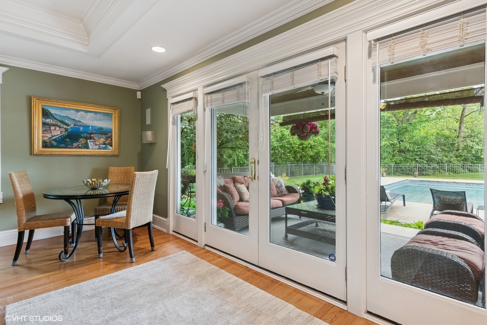 6730 South Madison Street Willowbrook, IL 60527 - Photo 13 of 52 a view of a dining room with furniture large windows and wooden floor