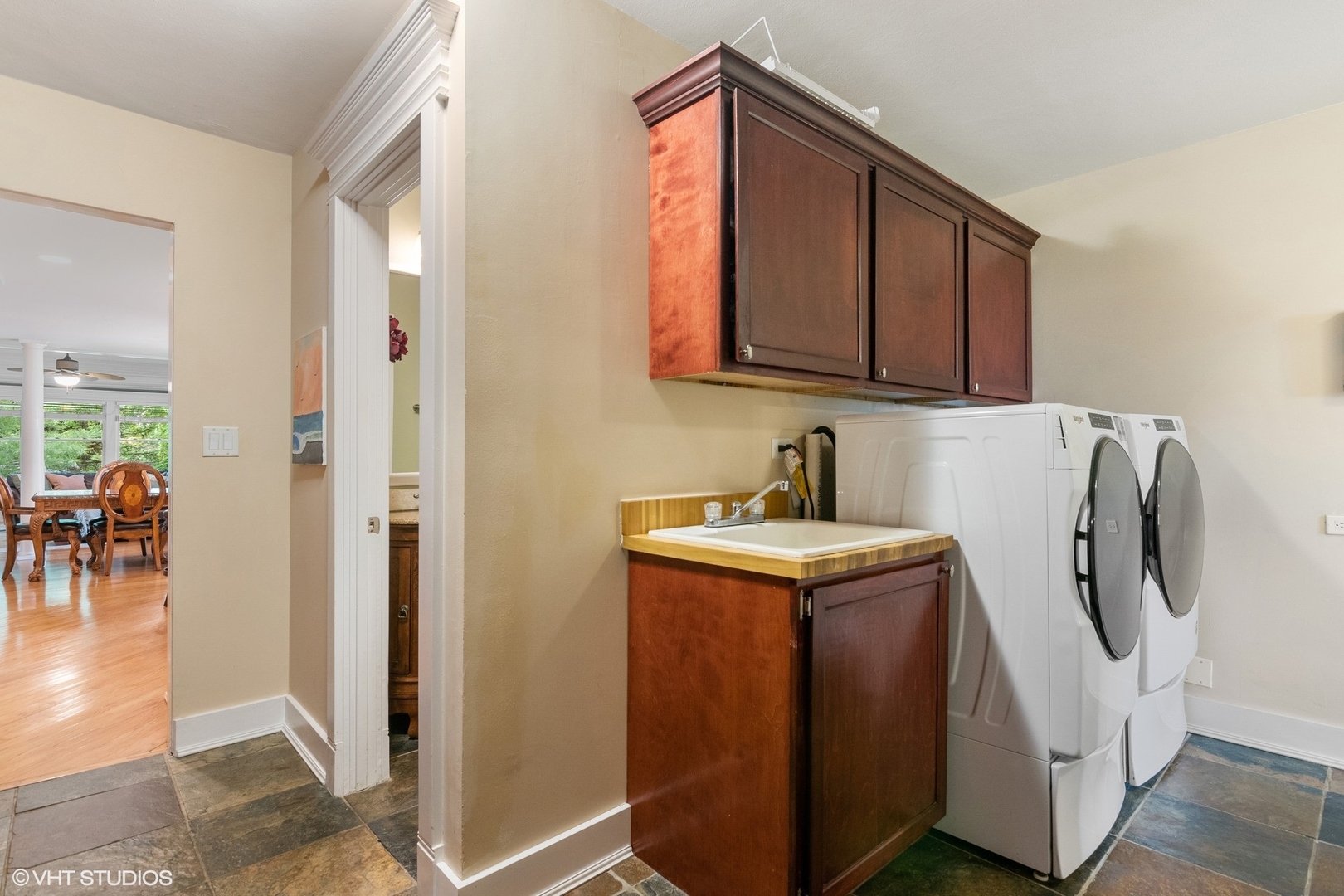 6730 South Madison Street Willowbrook, IL 60527 - Photo 18 of 52 a utility room with cabinets washer and dryer