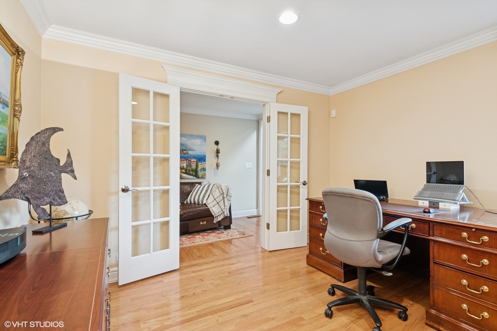 6730 South Madison Street Willowbrook, IL 60527 - Photo 22 of 52 a view of a workspace with wooden floor and a bedroom