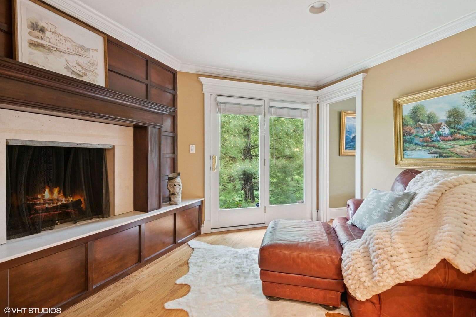 6730 South Madison Street Willowbrook, IL 60527 - Photo 24 of 52 a living room with furniture and a fireplace