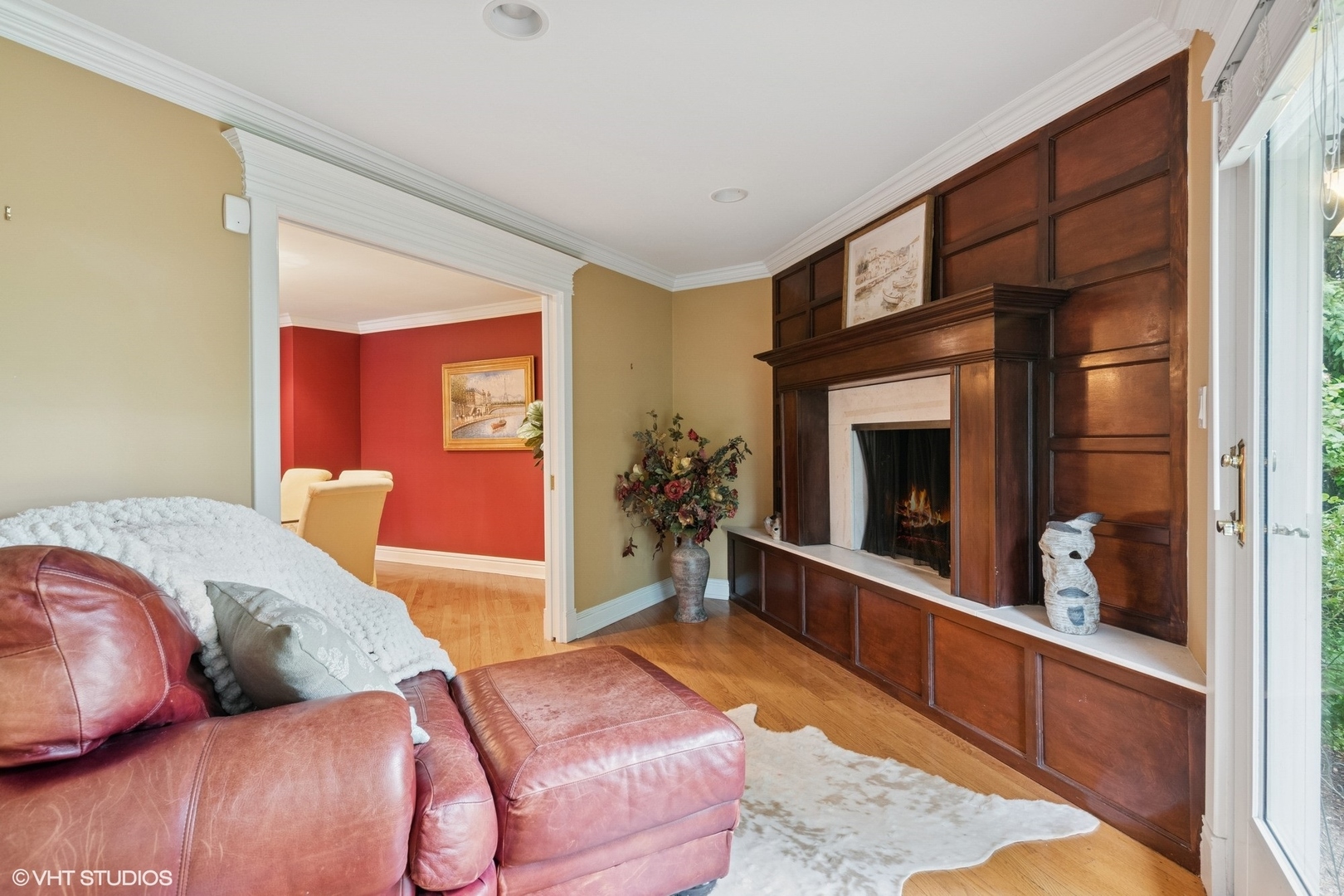 6730 South Madison Street Willowbrook, IL 60527 - Photo 25 of 52 a living room with furniture and a fireplace