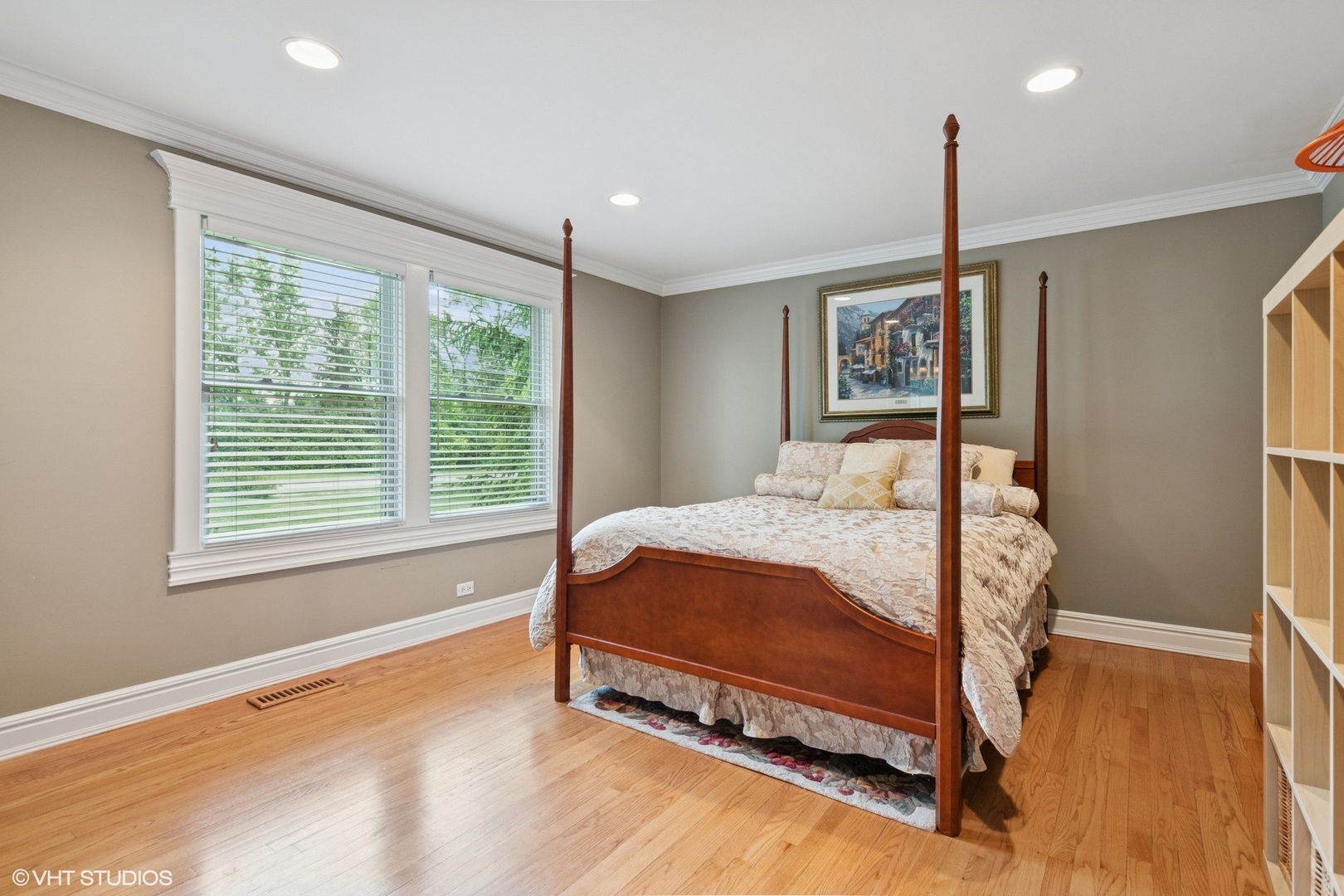 6730 South Madison Street Willowbrook, IL 60527 - Photo 28 of 52 a bed sitting in a spacious bedroom next to a window