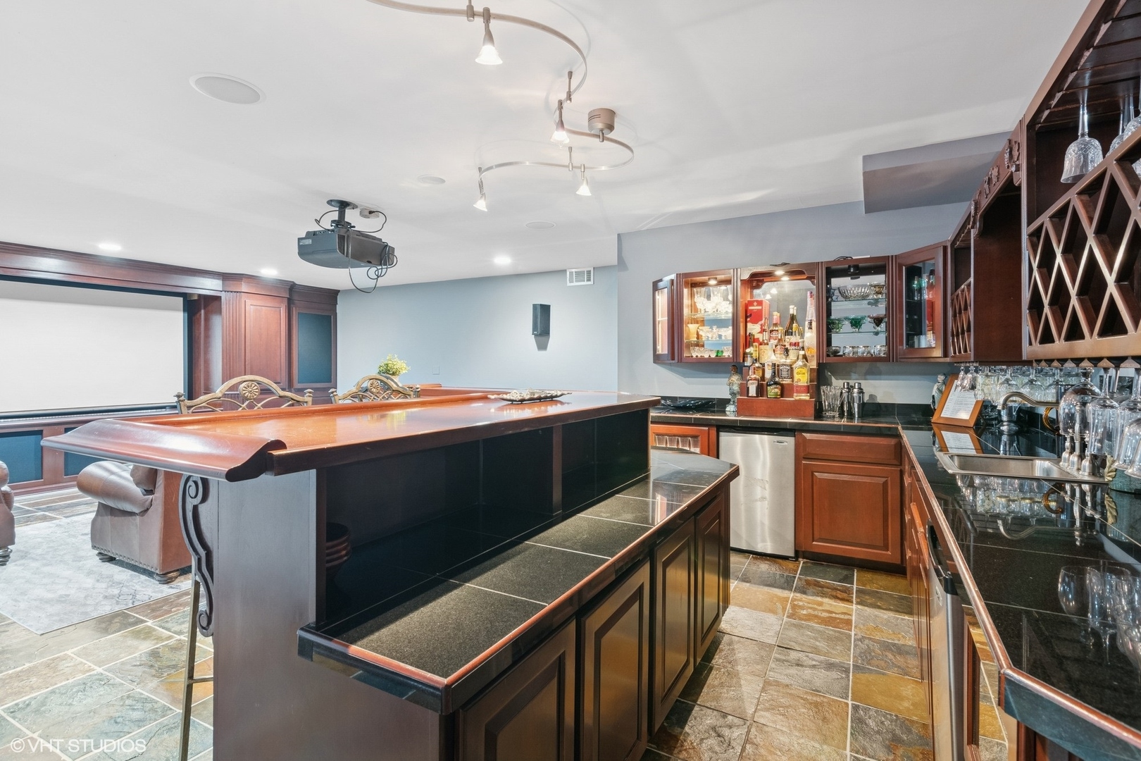 6730 South Madison Street Willowbrook, IL 60527 - Photo 41 of 52 a kitchen with stainless steel appliances granite countertop a stove and a sink