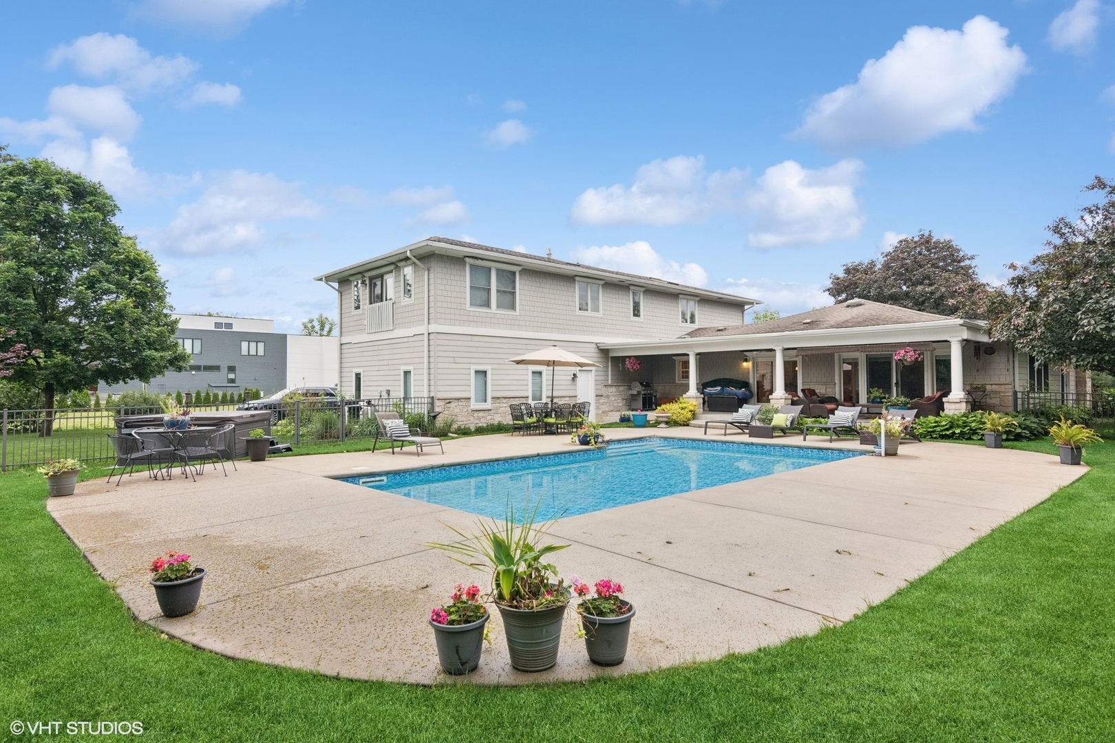 6730 South Madison Street Willowbrook, IL 60527 - Photo 45 of 52 a view of a house with swimming pool and a yard