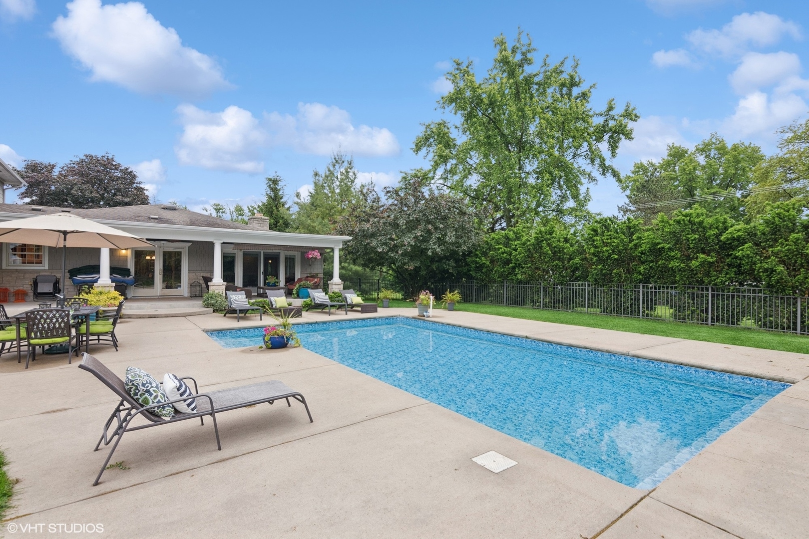 6730 South Madison Street Willowbrook, IL 60527 - Photo 48 of 52 a view of a house with swimming pool and sitting area