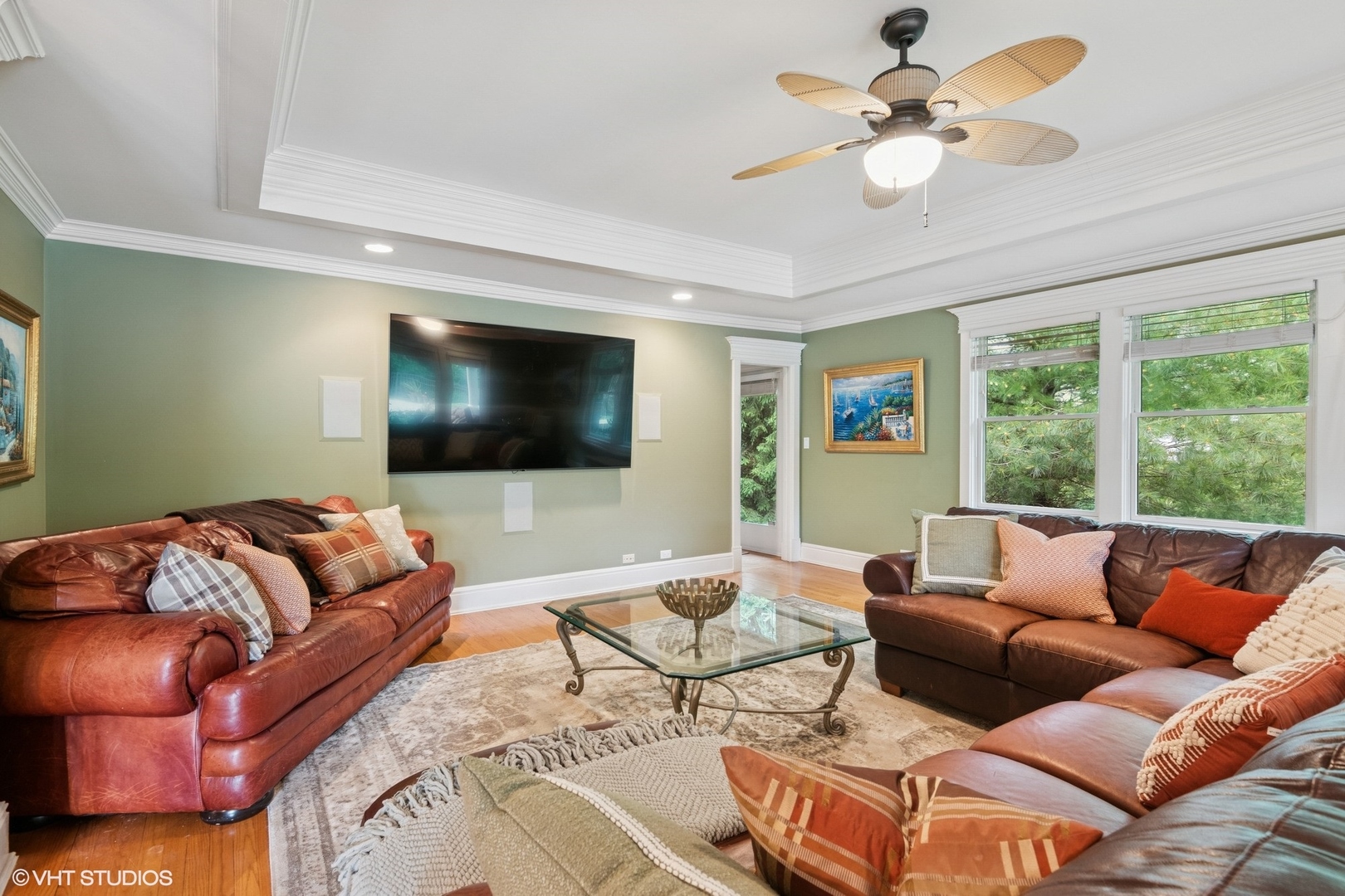 6730 South Madison Street Willowbrook, IL 60527 - Photo 10 of 52 a living room with furniture and a flat screen tv