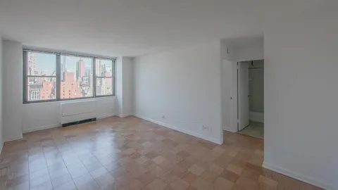 an empty room with windows