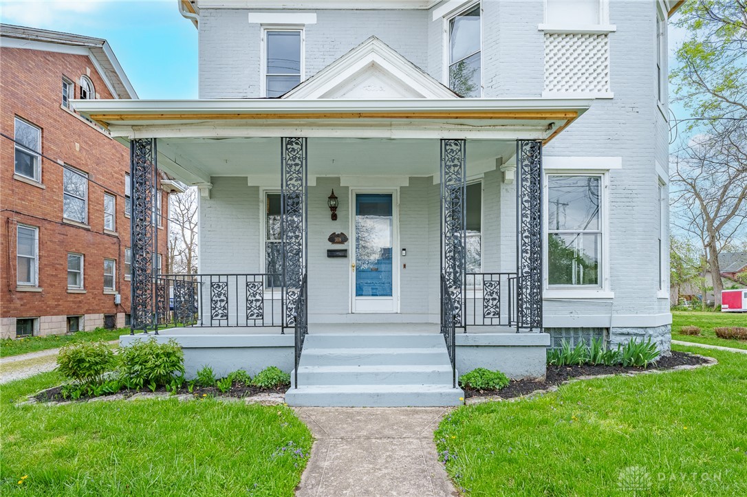 308 Yankee Road Middletown, OH 45044 - Photo 3 of 47 This charming home offers a welcoming facade with a classic porch and well-maintained landscaping.