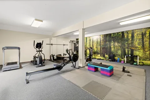 a view of a room with gym equipment