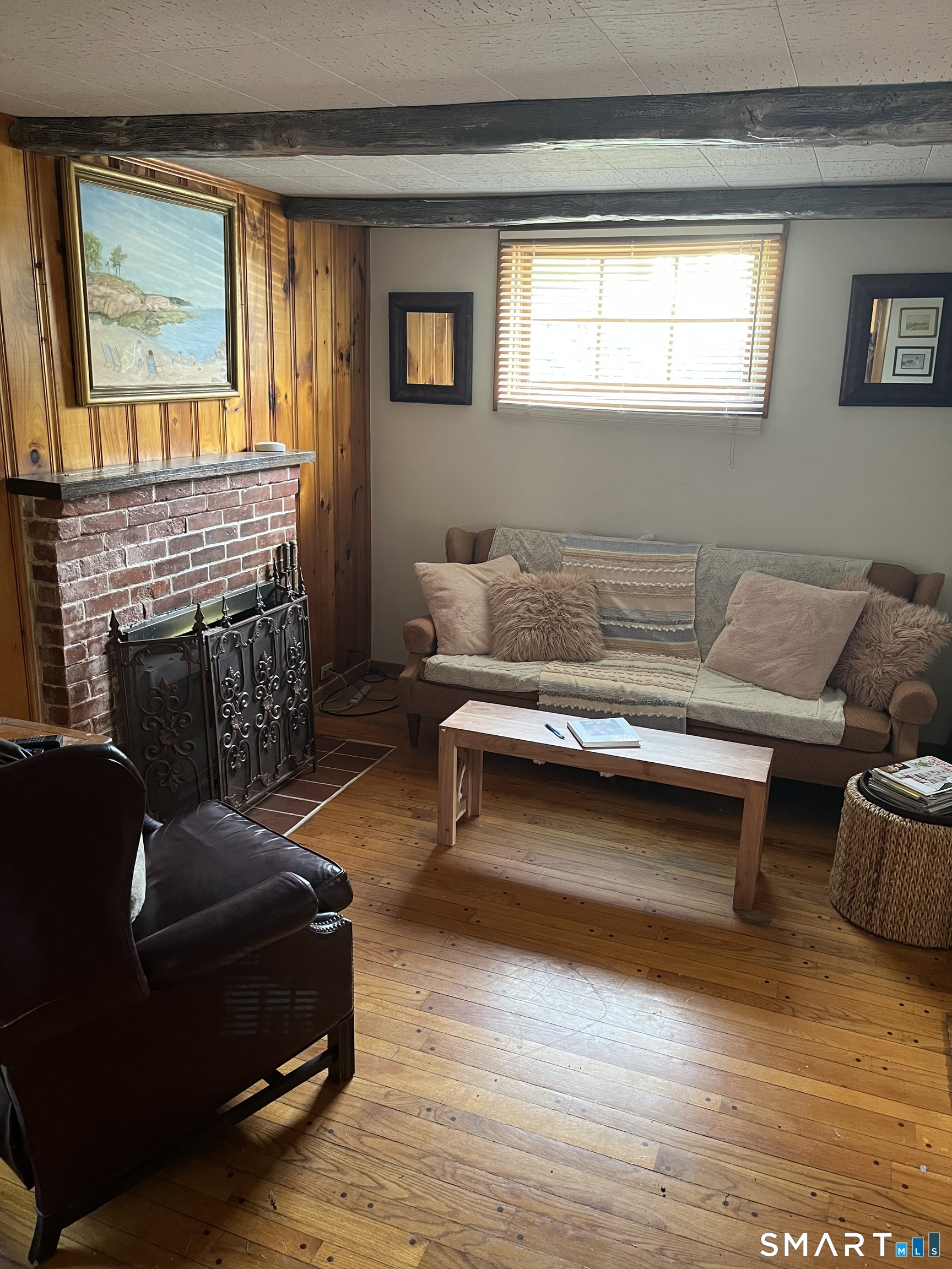 39 Little Bay Lane Branford, CT 06405 - Photo 13 of 20 a living room with furniture and a fireplace