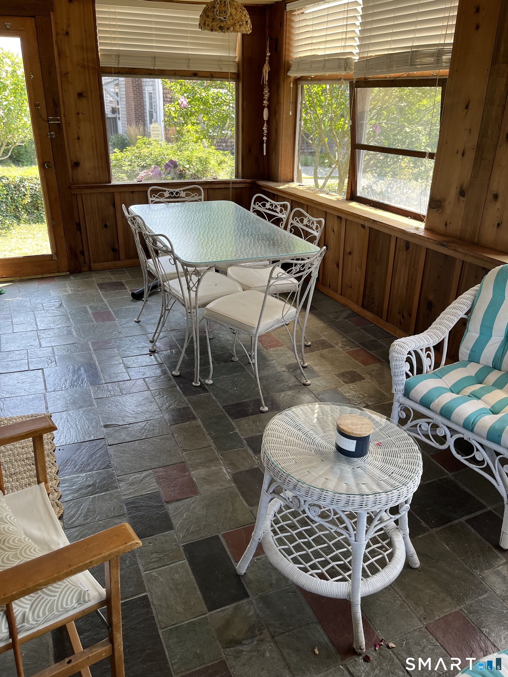 39 Little Bay Lane Branford, CT 06405 - Photo 14 of 20 a living room with furniture a window and a table